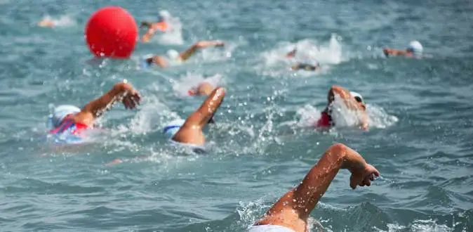 Red race mark being used for safety in swimming course manufactured by Norfloat International